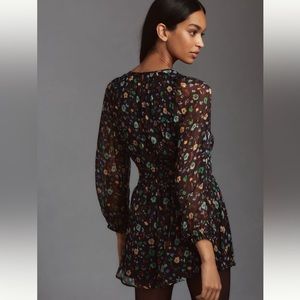 Long-Sleeve Somerset Romper: Printed Edition in Black Motif.